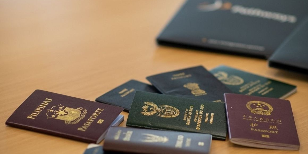 "Global map with visa stamps and a passport highlighting permanent residency opportunities."